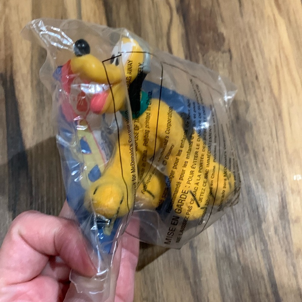 Disney Pluto plush figure w plastic head from McDonald’s in original package
